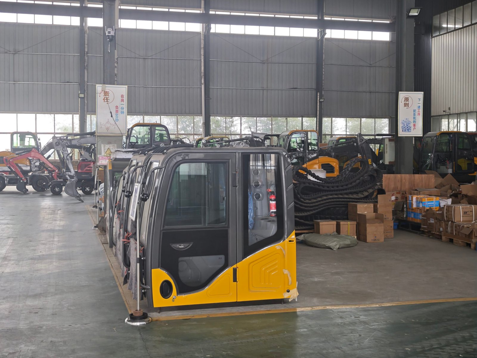 Factory production floor with heavy machinery assembly